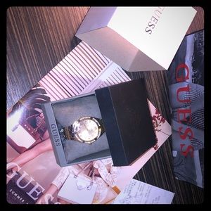 Women’s Gold Guess watch